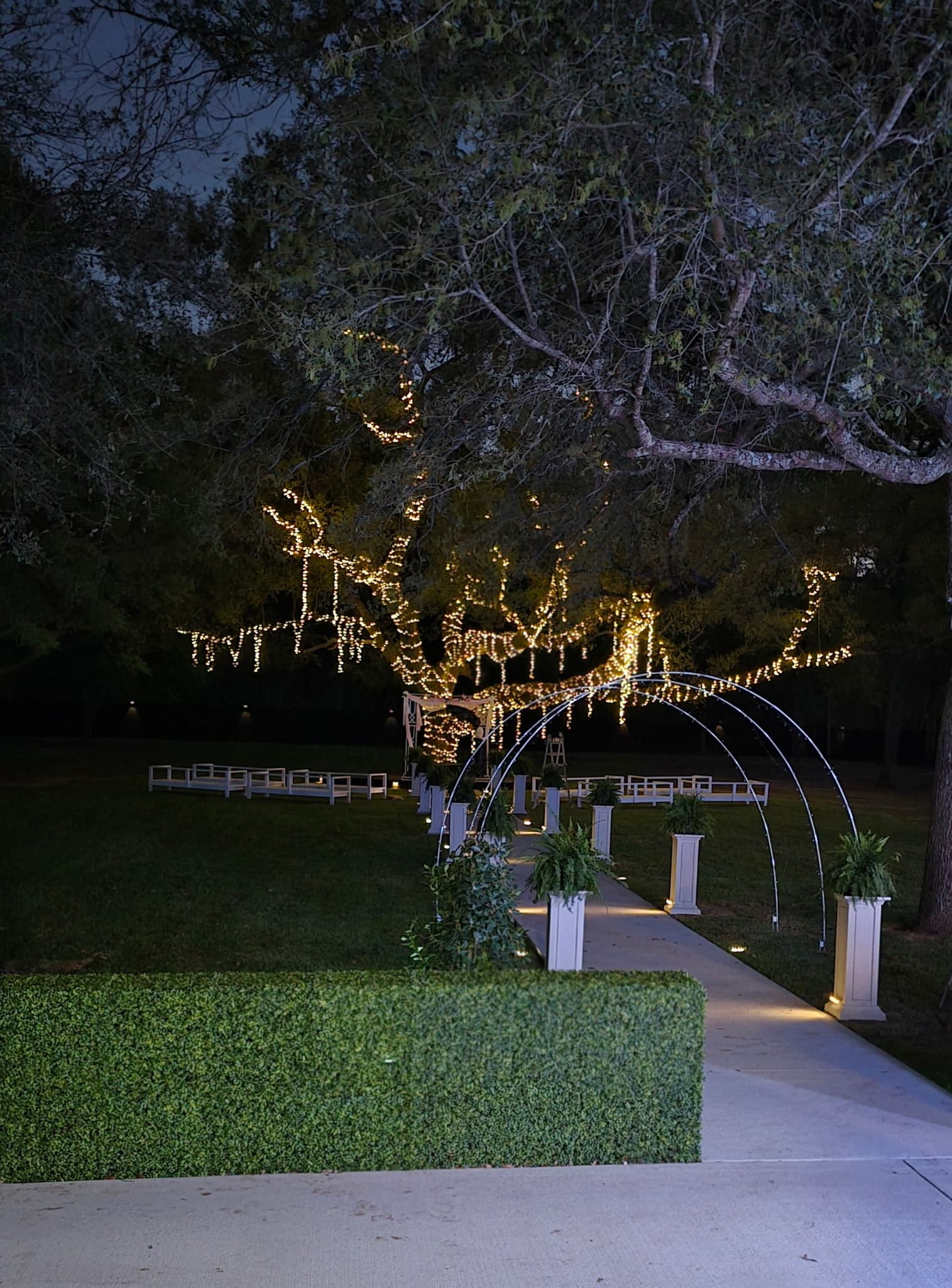 Illuminated venue walkway at dusk